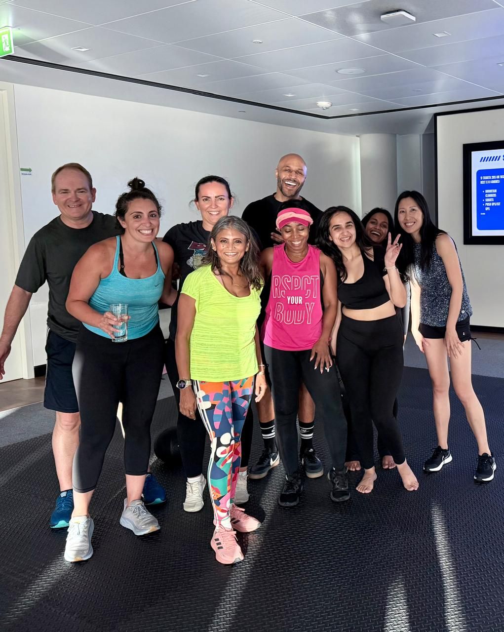 Visa team members after a TEC movement session in their Dubai office